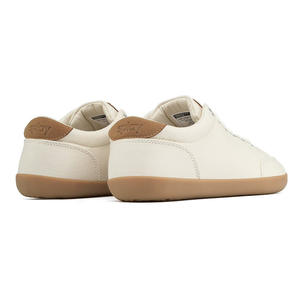 Light tan FREESTYLE 3 sneakers with brown accents and on a white background, showing the back of the shoes