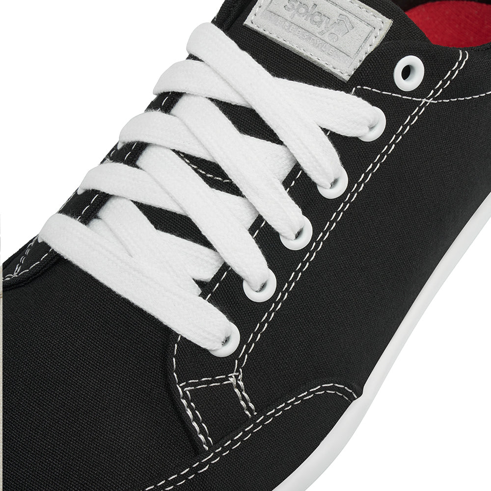 Close up view of the top and laces on the FREESTYLE 3 Coal, Black sneaker with white laces and light grey accents on a white background