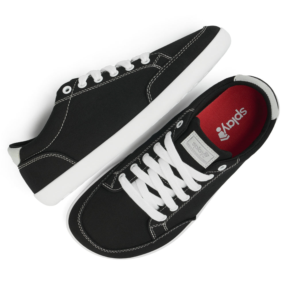 Top and Side view picture of the FREESTYLE 3 Coal, Black sneaker with white laces on a white background, shows red insole with the Splay logo.