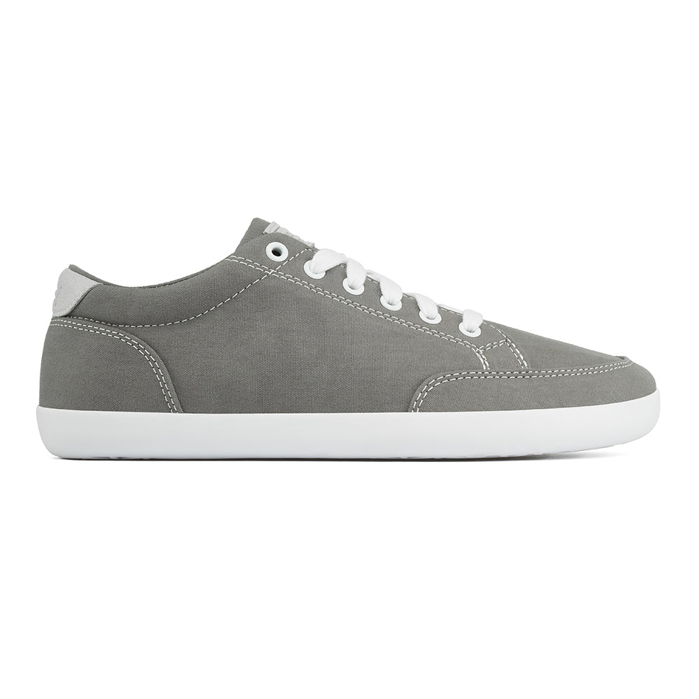 Side picture of the FREESTYLE 3 Stone, grey sneaker with white laces, and white outsole on a white background