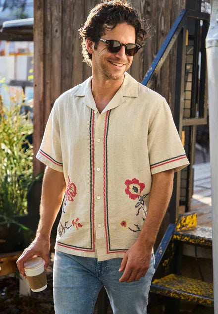 Man wearing a lightweight Portuguese Flannel short-sleeve shirt from STAG Provisions, styled for warm summer weather.