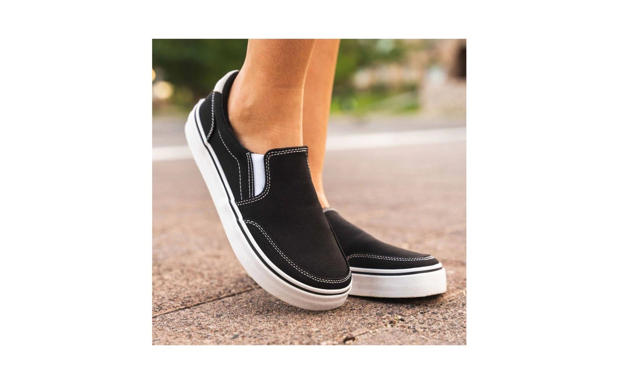 An image of a model wearing STREETSTYLE Slip-On Coal Barefoot Shoes from Splay 