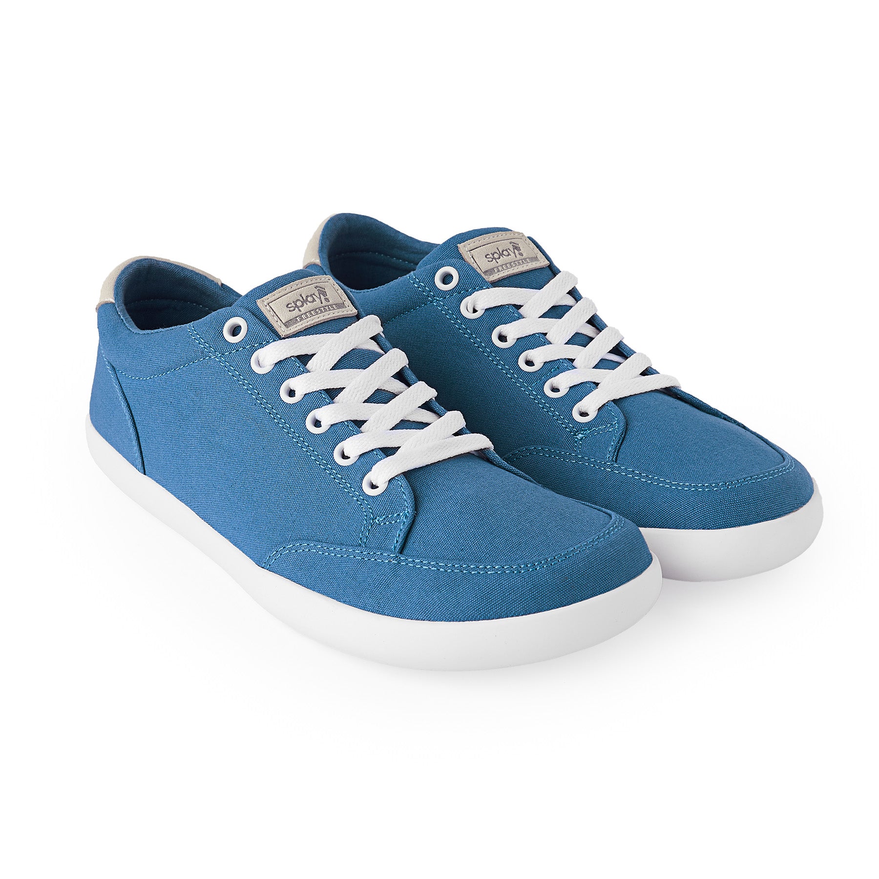 Pair of blue zero drop shoes from Splay with white laces, featuring a flat sole and flexible design for comfort.