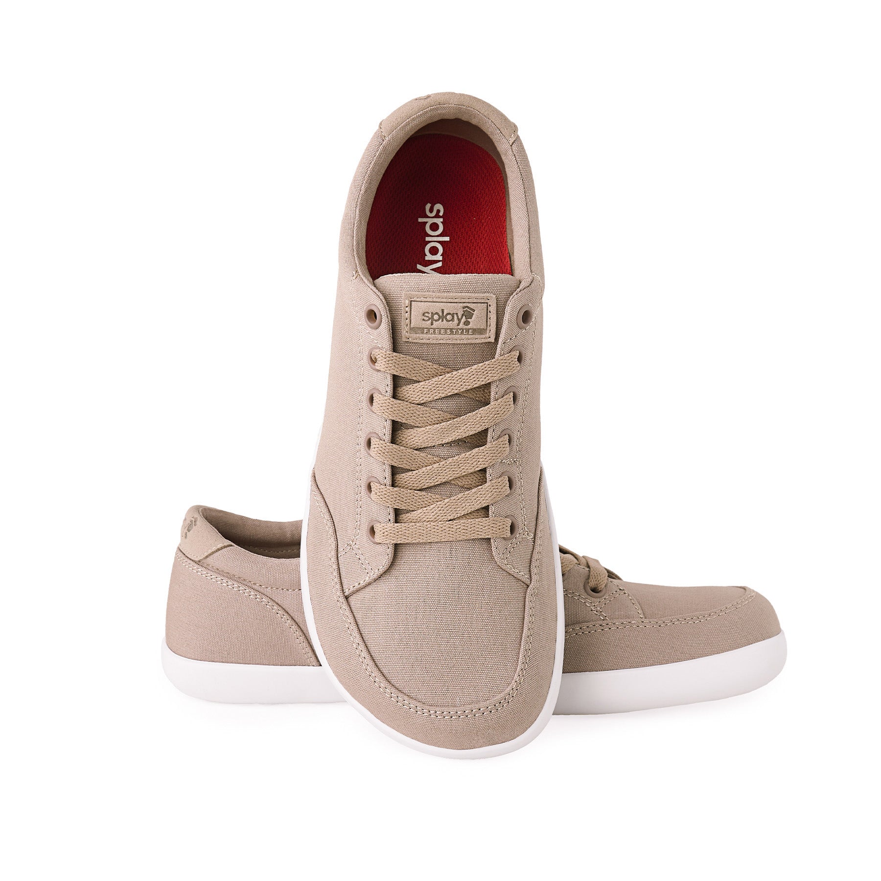 Tan lace-up sneakers with a white rubber sole, featuring the Splay brand logo on the tongue and a red insole.