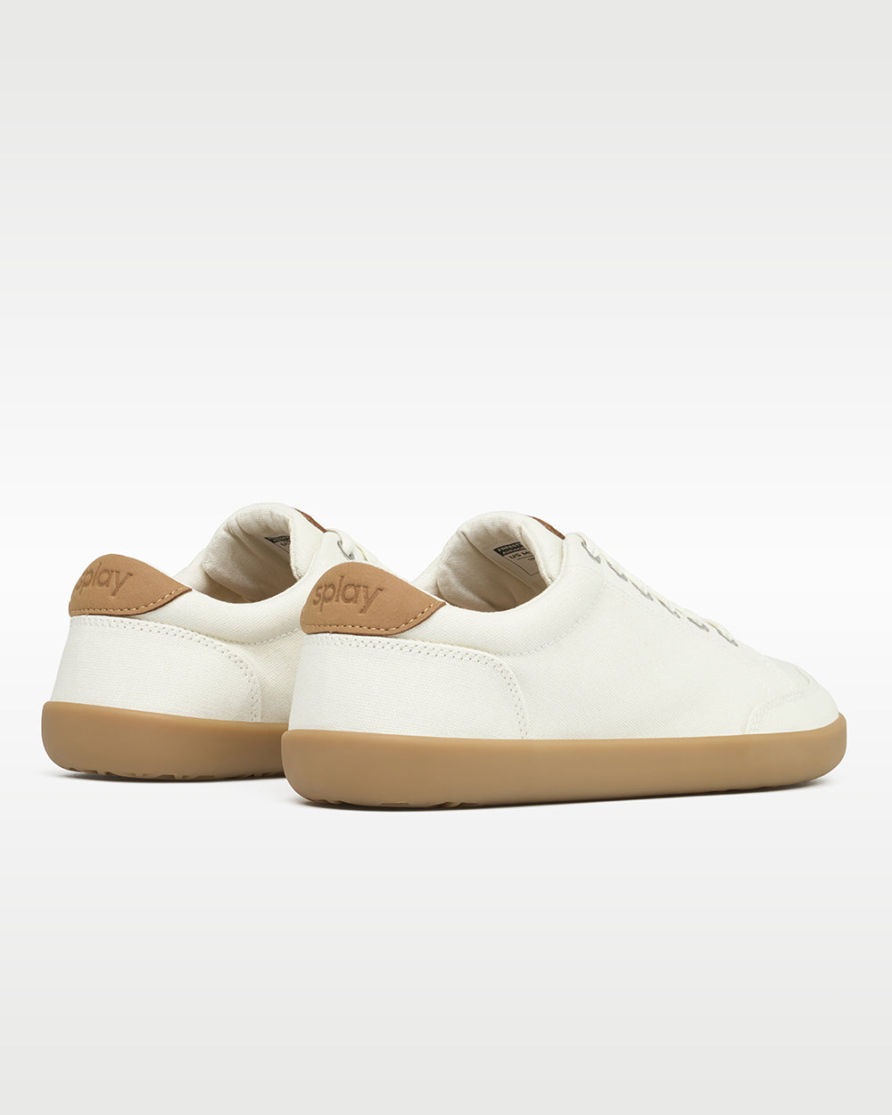Splay Freestyle Almond barefoot shoes — minimal low-top lace-up sneaker, pair viewed from behind, heels toward the camera