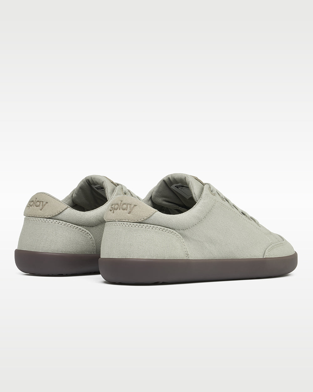 Splay Freestyle Ash barefoot shoes — minimal low-top lace-up sneaker, pair viewed from behind, heels toward the camera