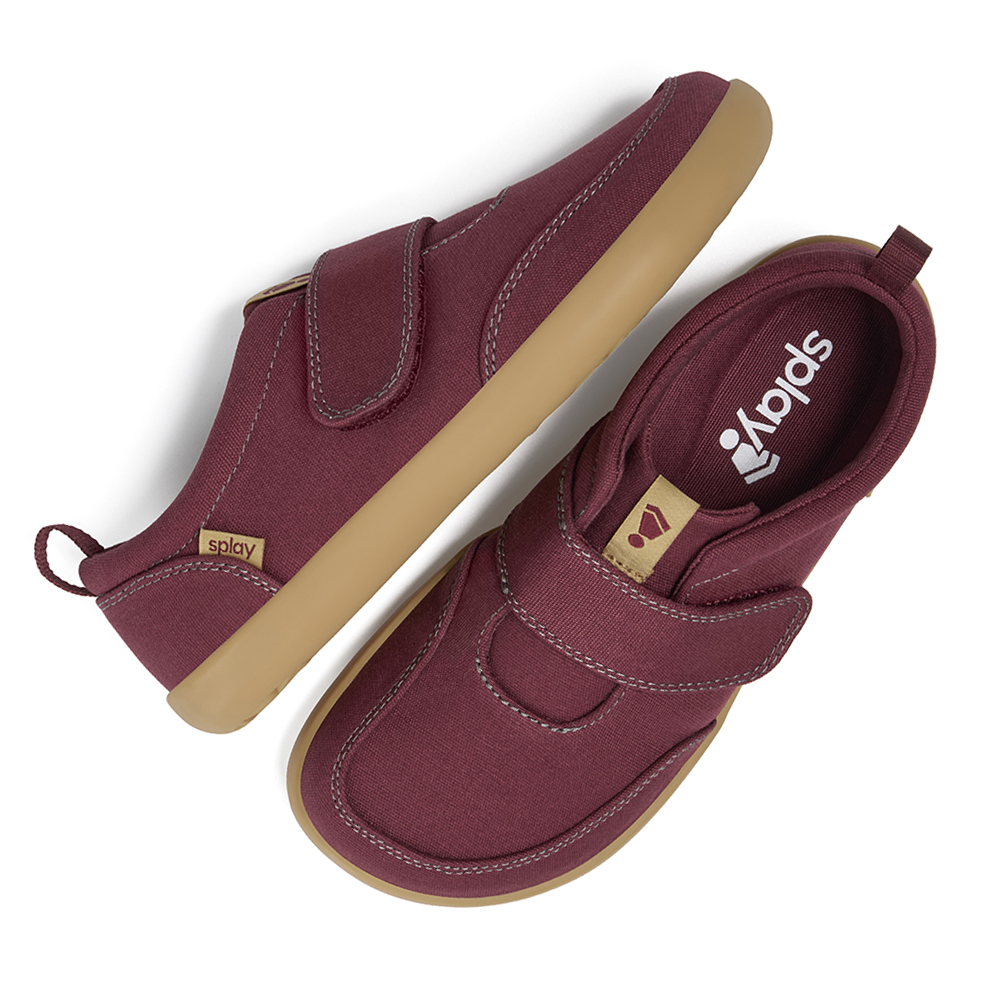 Kids' plum-colored zero drop shoe with velcro strap and tan sole promoting healthy foot alignment.