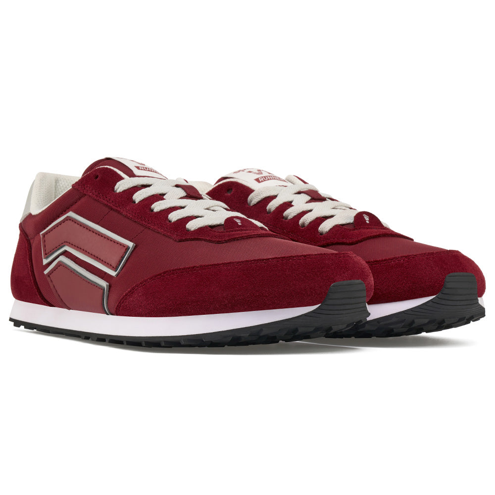 Pair of red running shoes with suede and leather panels, featuring a durable sole and performance design.