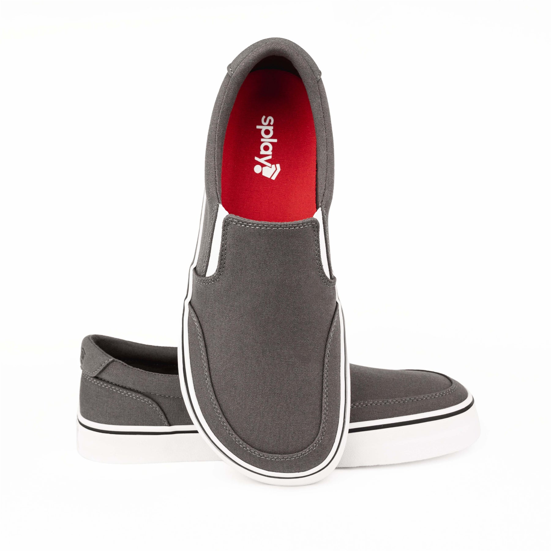 Close-up of grey Splay STREESTYLE SLIP-ON shoes, highlighting the clean lines, white sole, and red interior with the Splay logo.