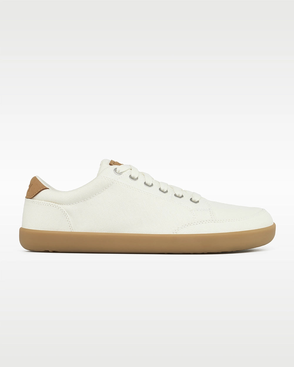 Side profile of the Splay FREESTYLE Almond '26 cream canvas barefoot sneaker with a gum outsole.