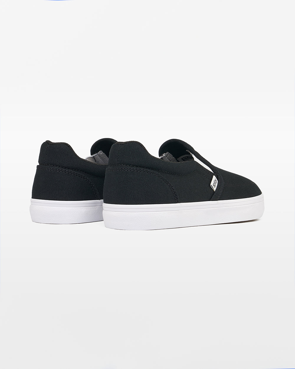 Splay Kids REV SO Berlin barefoot shoes — kids' canvas slip-on, pair shot from above, one shoe tipped up to show the insole