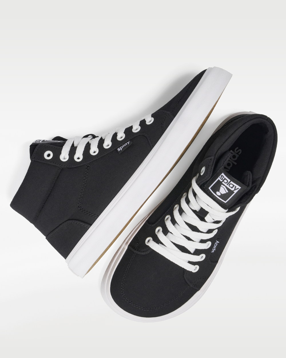 Splay REV HT Canvas Berlin barefoot shoes — high-top skate shoe, pair shot from above, one shoe tipped up to show the insole