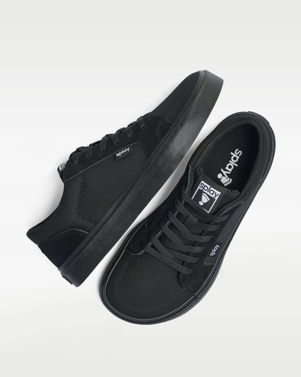 Splay REV LT Original Carlsbad barefoot shoes — low-top skate shoe, pair shot from above, one shoe tipped up to show the insole