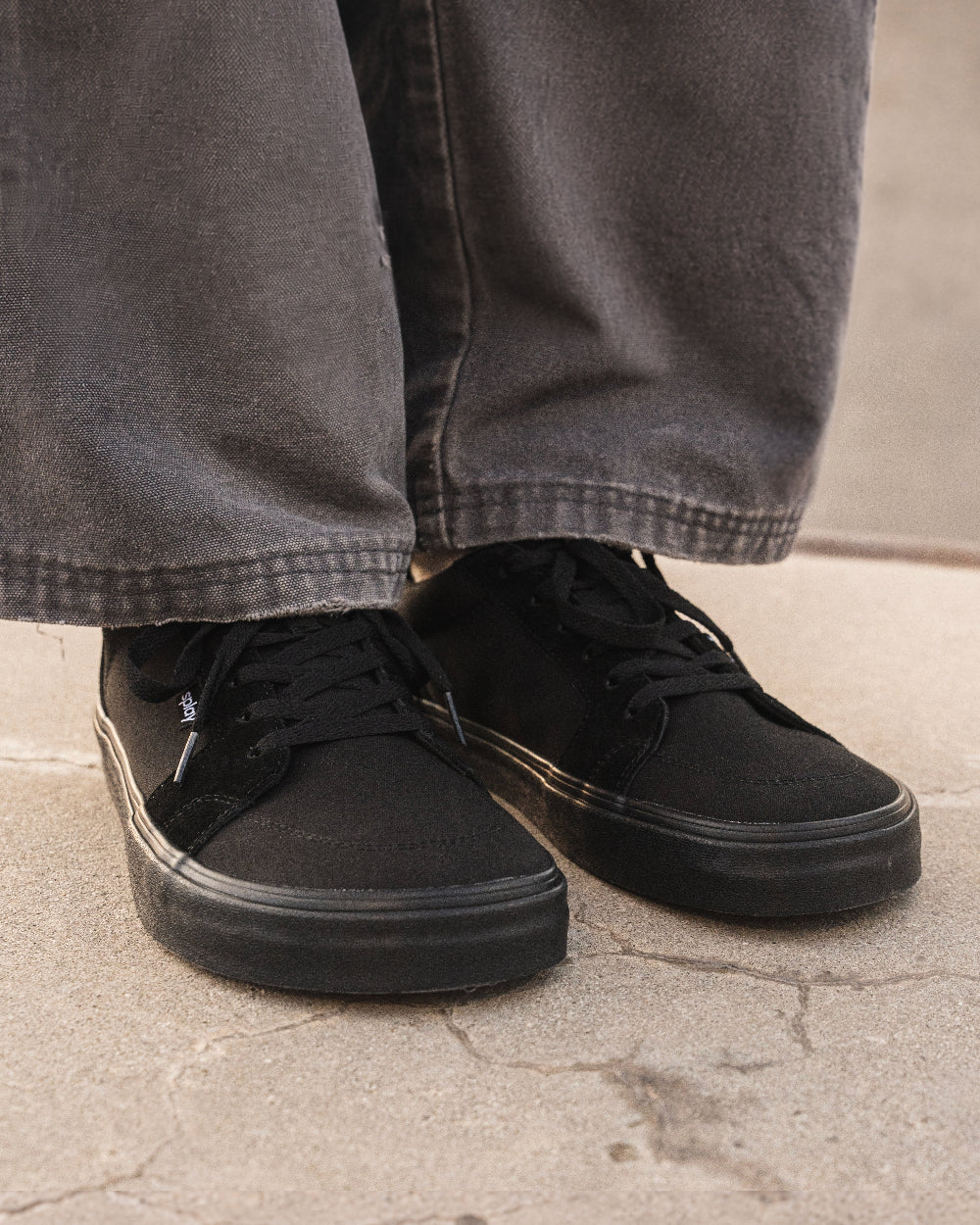 Splay REV LT Original Carlsbad barefoot shoes — low-top skate shoe, lifestyle photo, the shoes shown in use outdoors