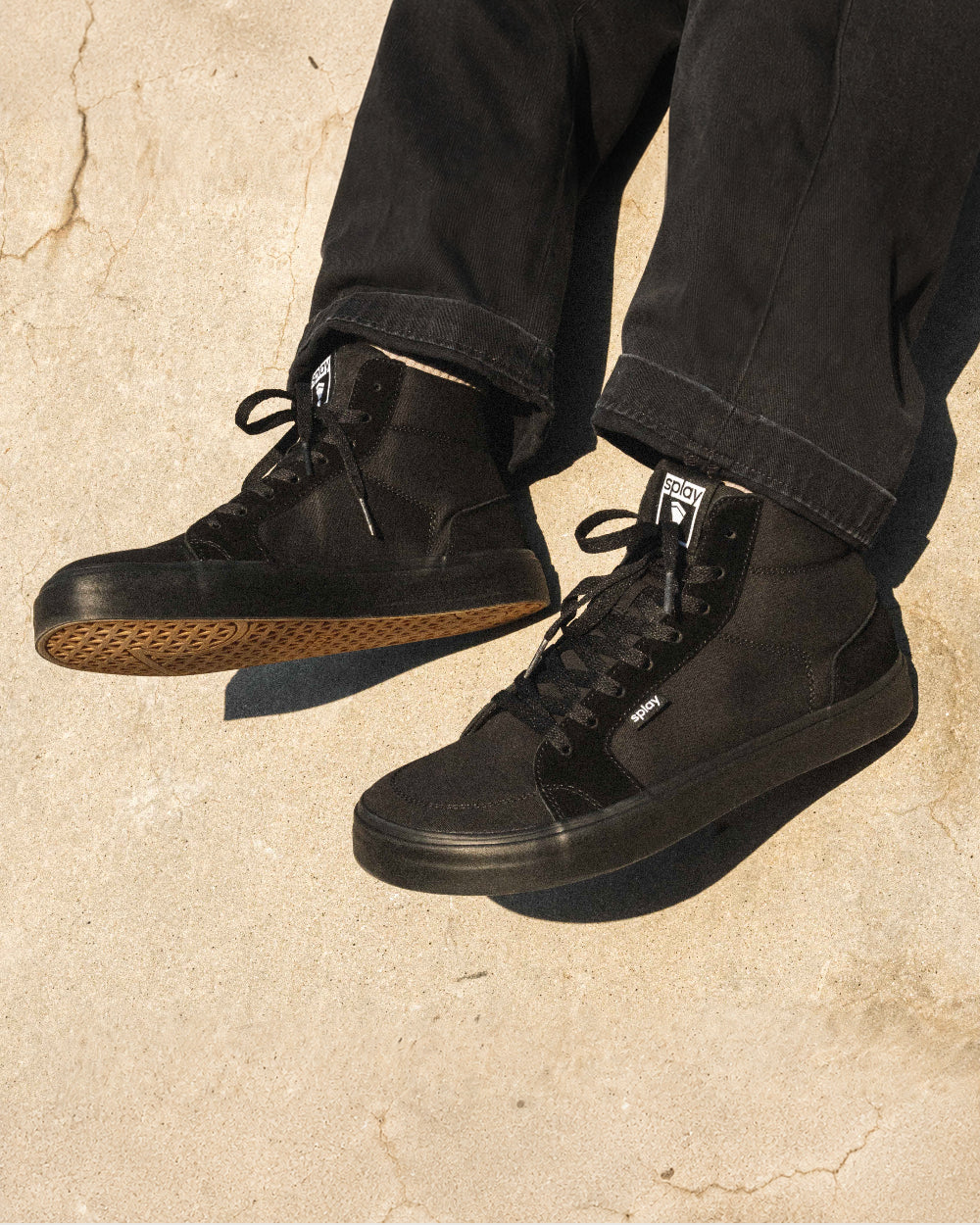 Splay REV HT Original Carlsbad barefoot shoes — high-top skate shoe, lifestyle photo, the shoes shown in use outdoors