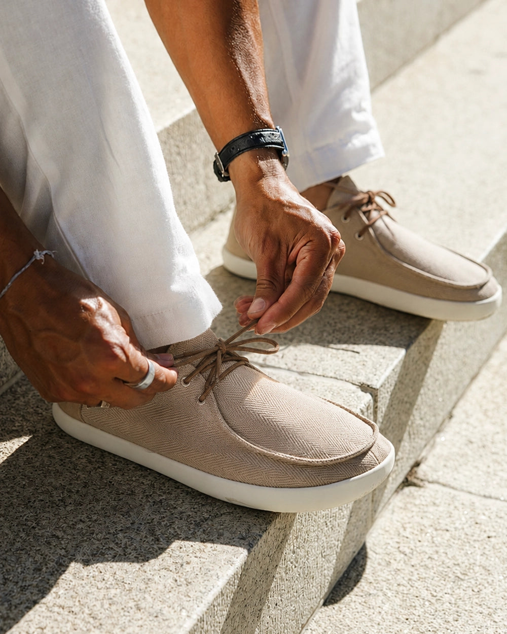 Person tying Splay WEEKENDER Driftwood hemp barefoot shoes