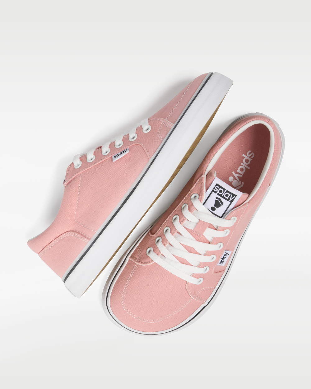 Splay REV LT Canvas Havana barefoot shoes — low-top skate shoe, pair shot from above, one shoe tipped up to show the insole