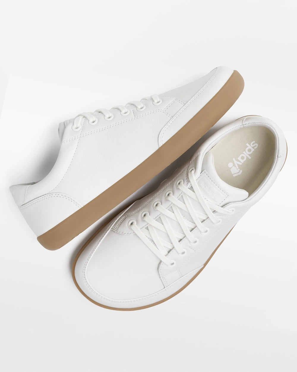 Pair of Splay FREESTYLE LEATHER Ivory barefoot shoes, angled top view