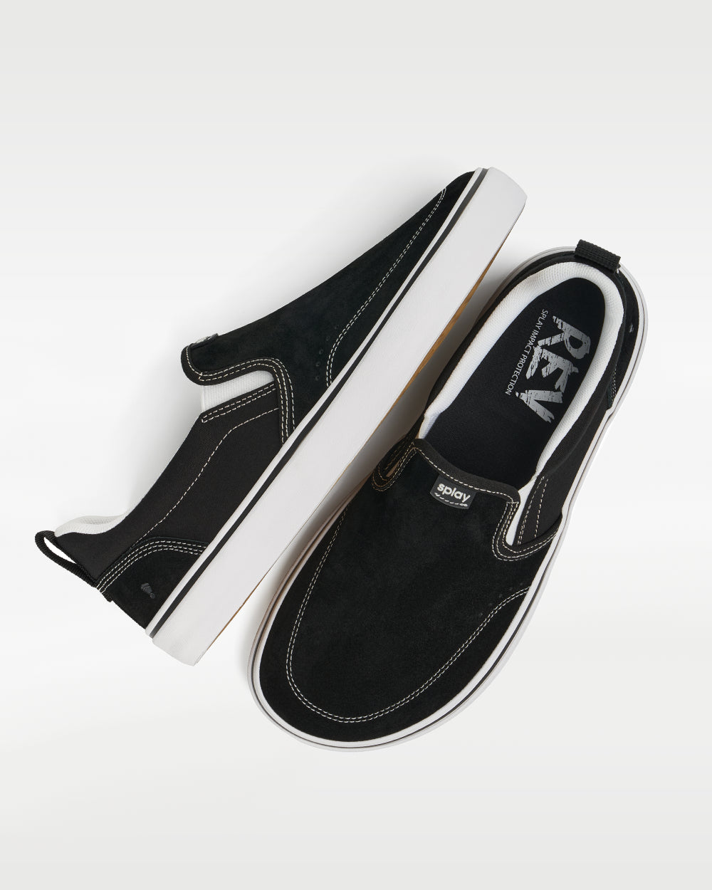 Splay REV SOS Los Angeles barefoot shoes — suede slip-on, pair shot from above, one shoe tipped up to show the insole