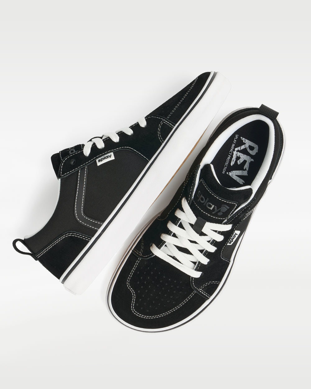 Splay REV LTS Los Angeles barefoot shoes — low-top suede skate shoe, pair shot from above, one shoe tipped up to show the insole