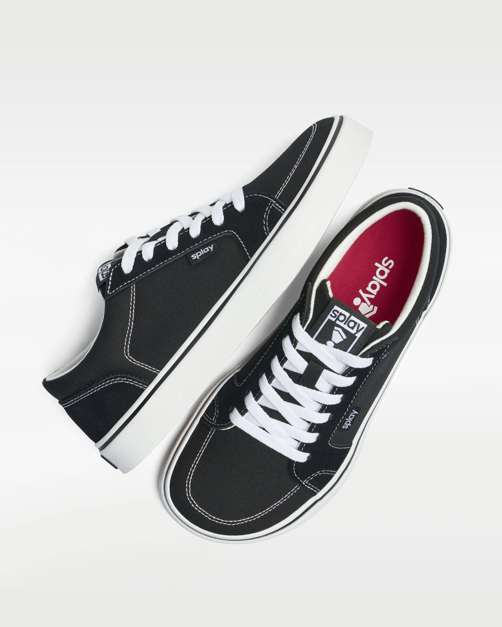 Splay REV HT Original Los Angeles barefoot shoes — high-top skate shoe, pair shot from above, one shoe tipped up to show the insole