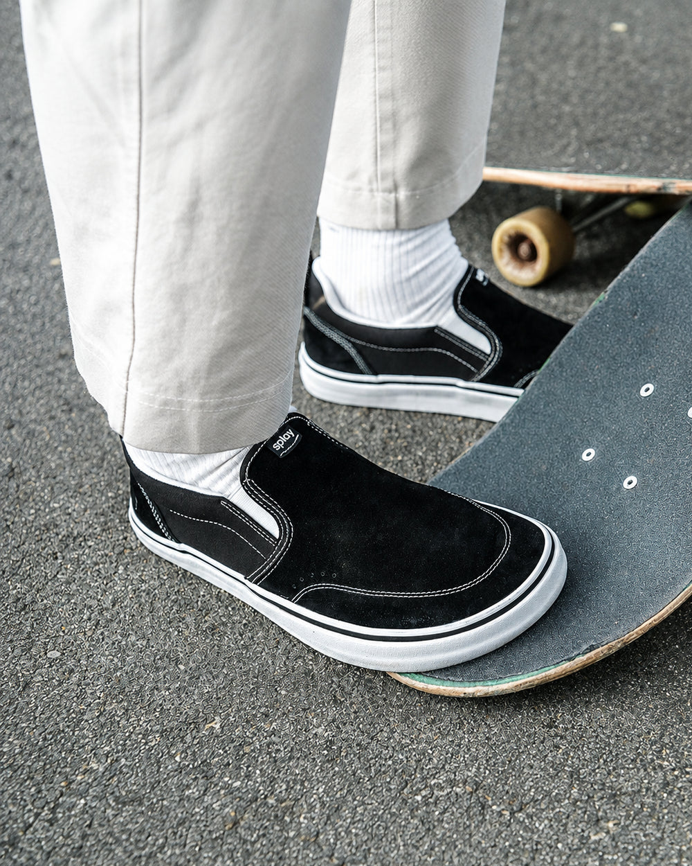 Splay REV SOS Los Angeles barefoot shoes — suede slip-on, lifestyle photo, the shoes shown in use outdoors