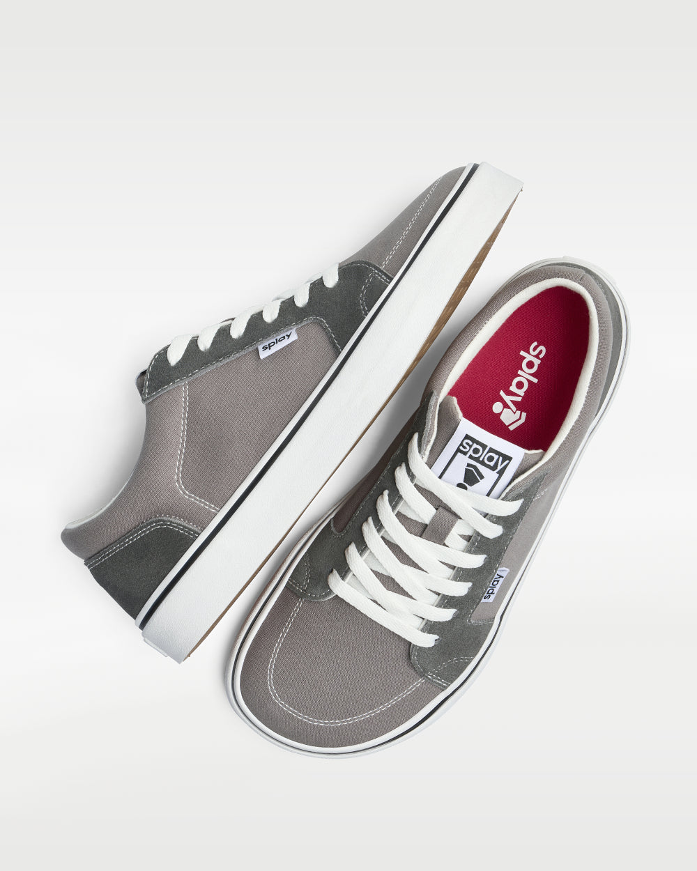 Splay REV LT Original London barefoot shoes — low-top skate shoe, pair shot from above, one shoe tipped up to show the insole