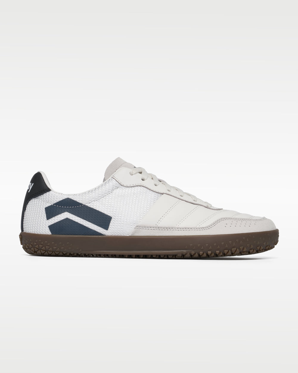 Splay Dominari Lux indoor soccer shoe for turf and court, white with navy chevron and gum outsole, side profile