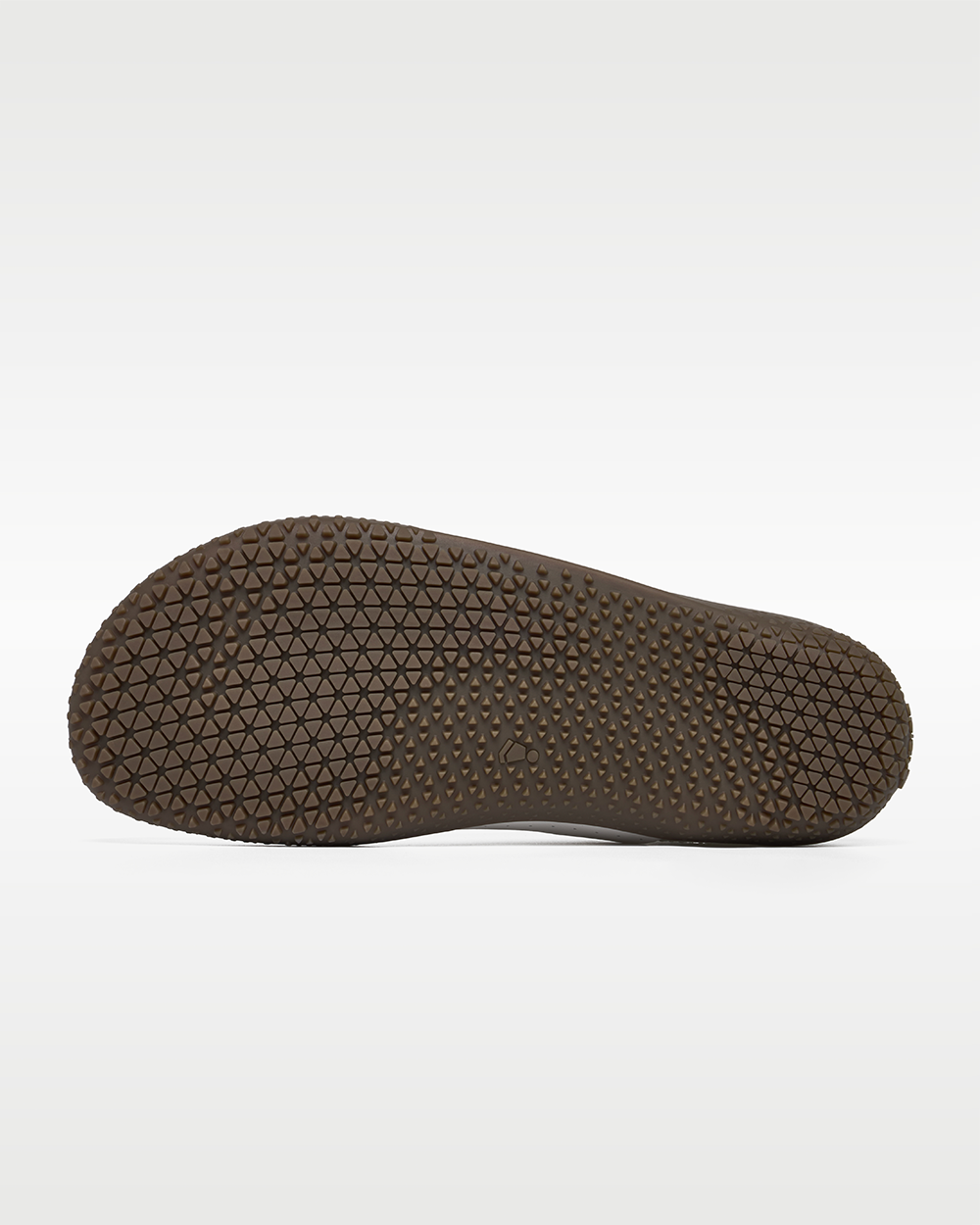 DOMINARI Lux barefoot shoes — low-top indoor soccer shoe with a gum sole, outsole tread of a single shoe
