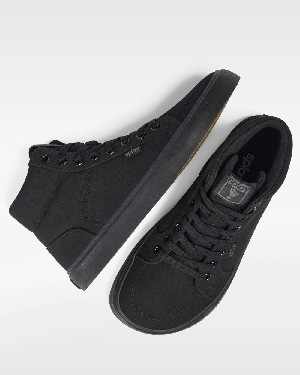 Splay REV HT Canvas New York barefoot shoes — high-top skate shoe, pair shot from above, one shoe tipped up to show the insole