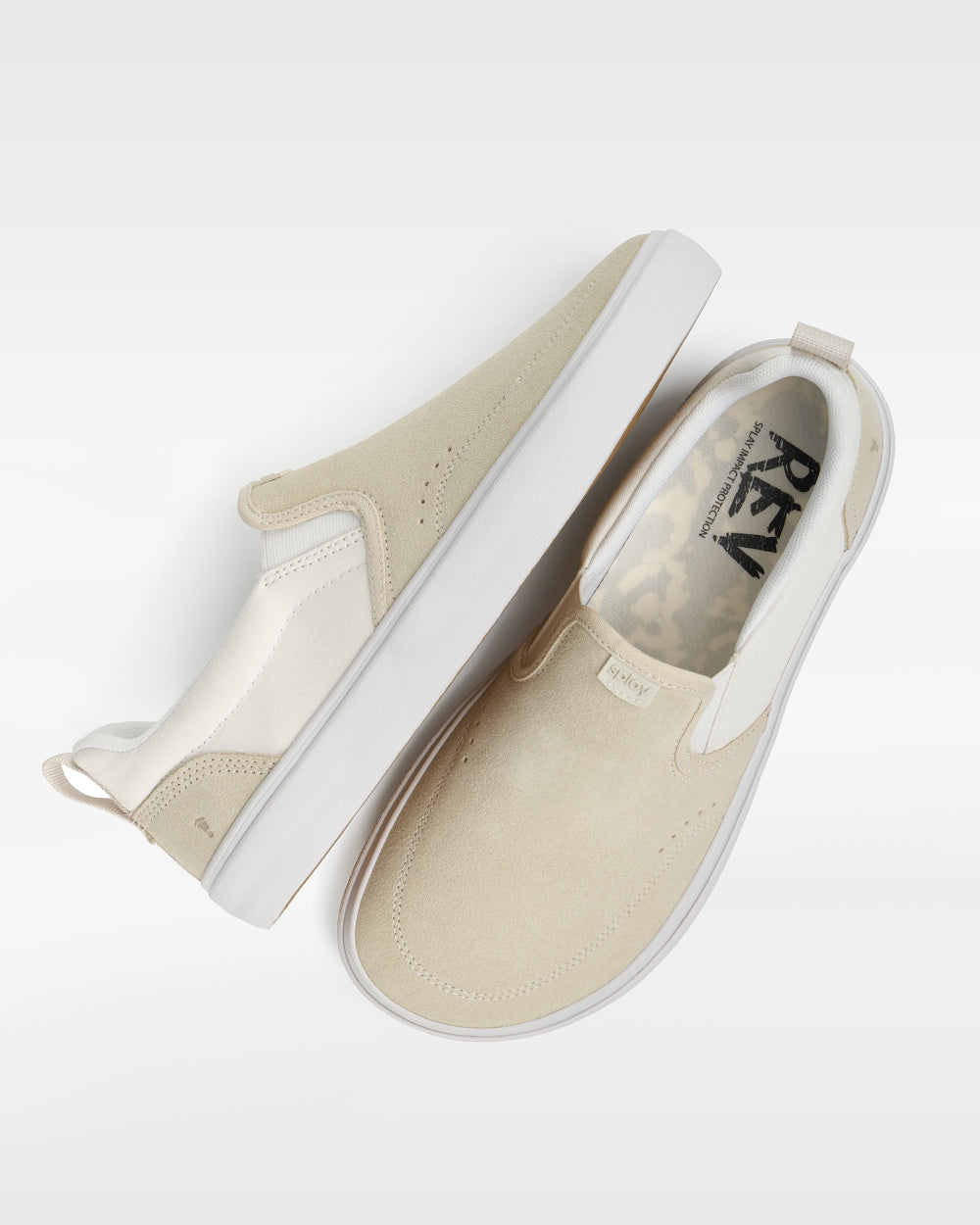 Splay REV SOS Osaka barefoot shoes — suede slip-on, pair shot from above, one shoe tipped up to show the insole