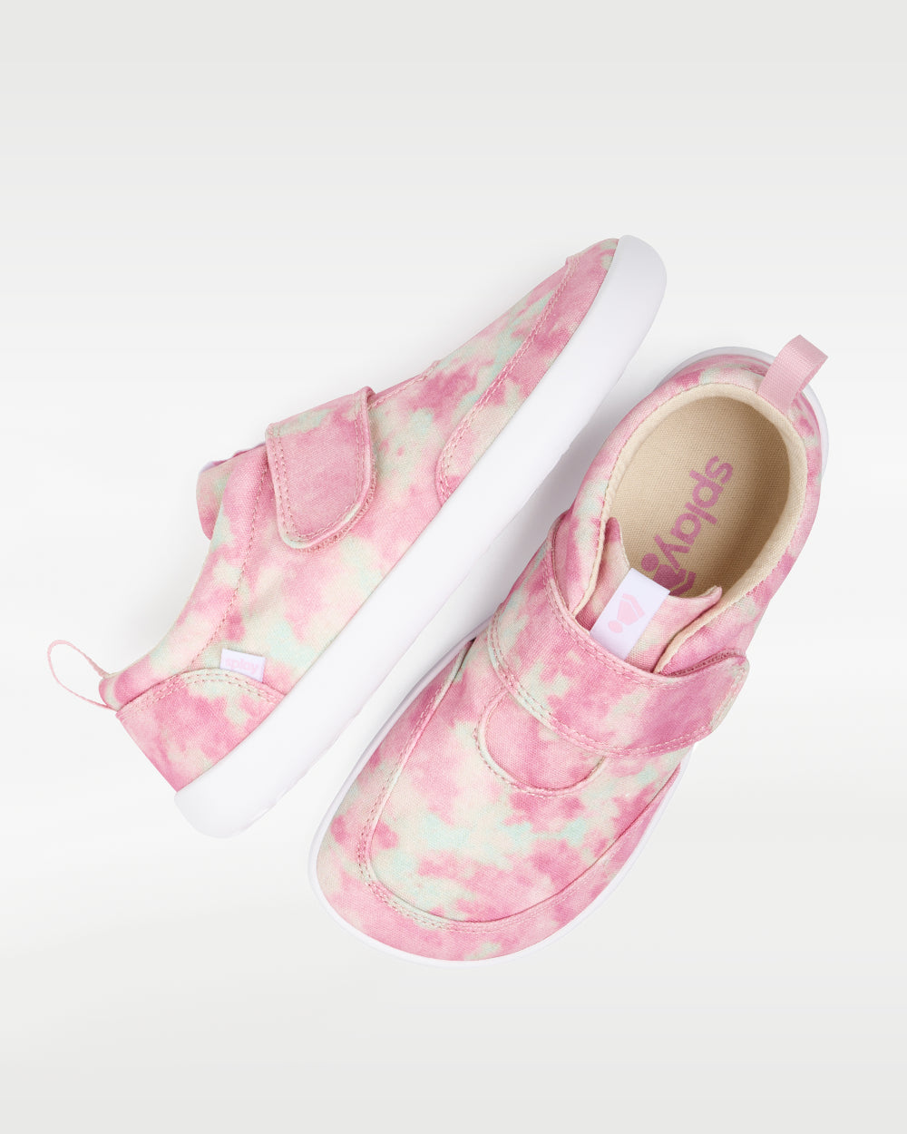 Splay Explore Kids Pink Paradise barefoot shoes — kids' low-top shoe with a hook-and-loop strap, pair shot from above, one shoe tipped up to show the insole
