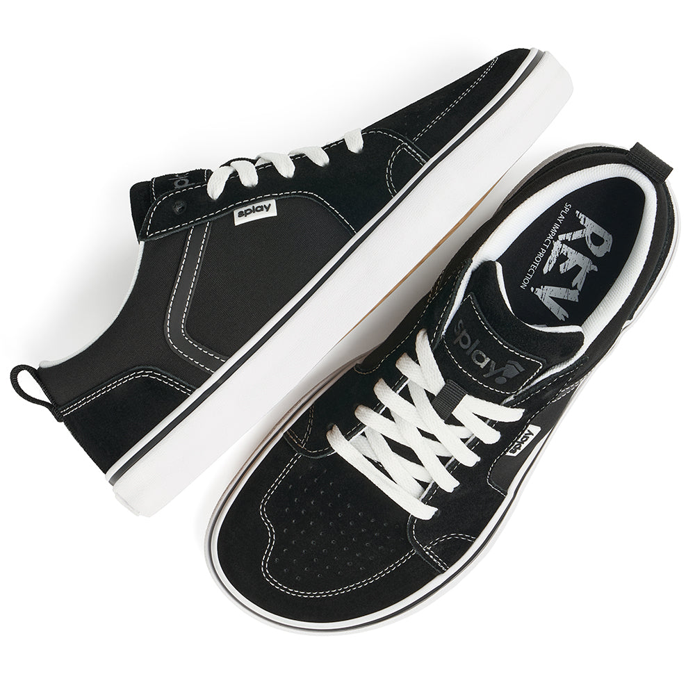 Pair of black REV LTS Los Angeles barefoot skate shoes with white foxing and gum outsole on a white background.