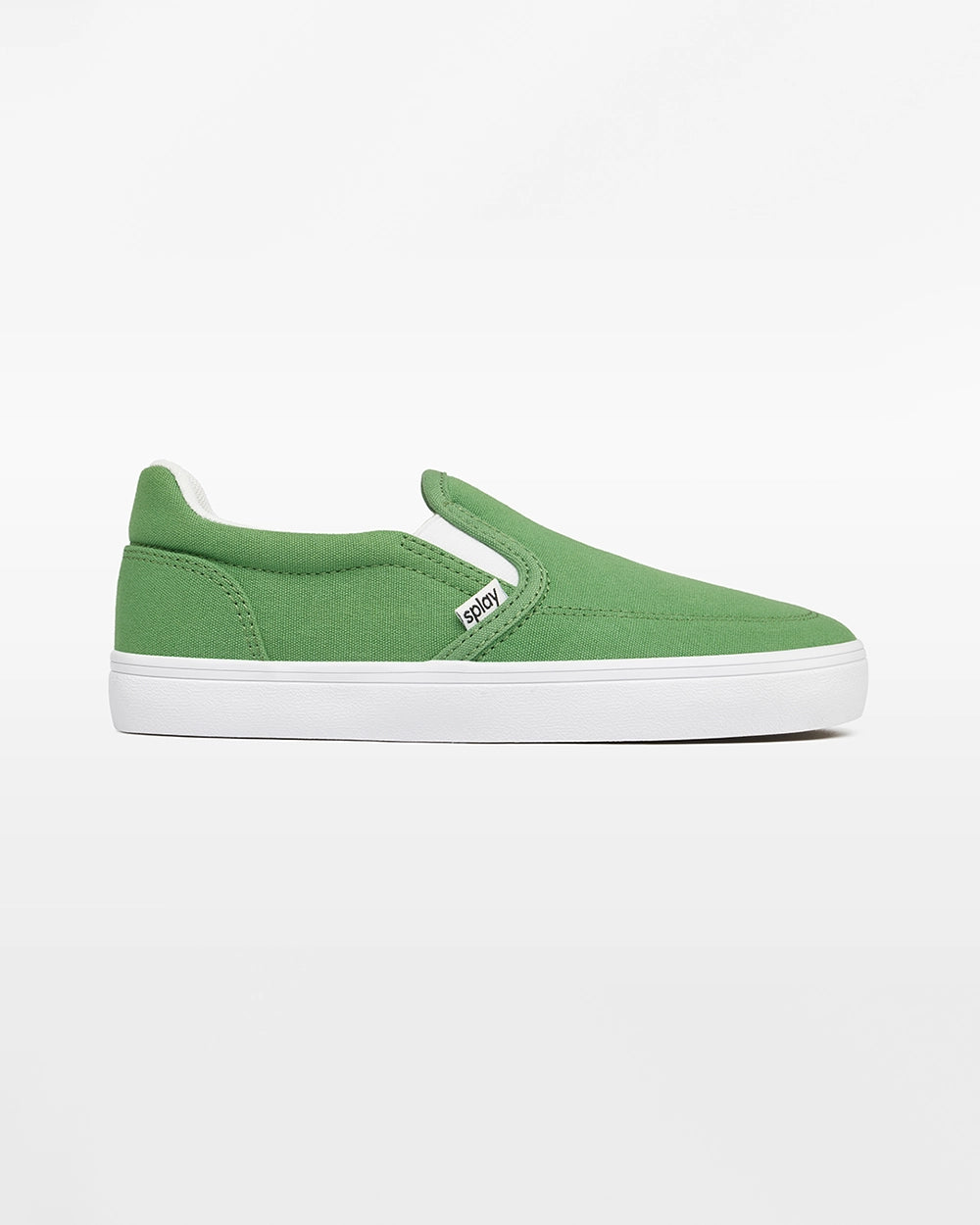 Side view of a green Splay Kids REV SO Rio canvas barefoot slip-on shoe with a white sole.