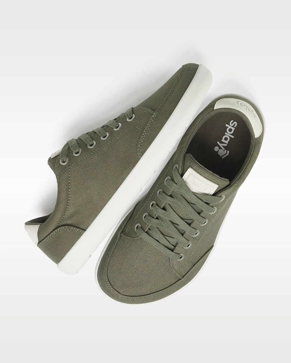 Top and side view of Splay FREESTYLE Sage '26 green canvas barefoot sneakers with white soles and Splay-branded insoles.