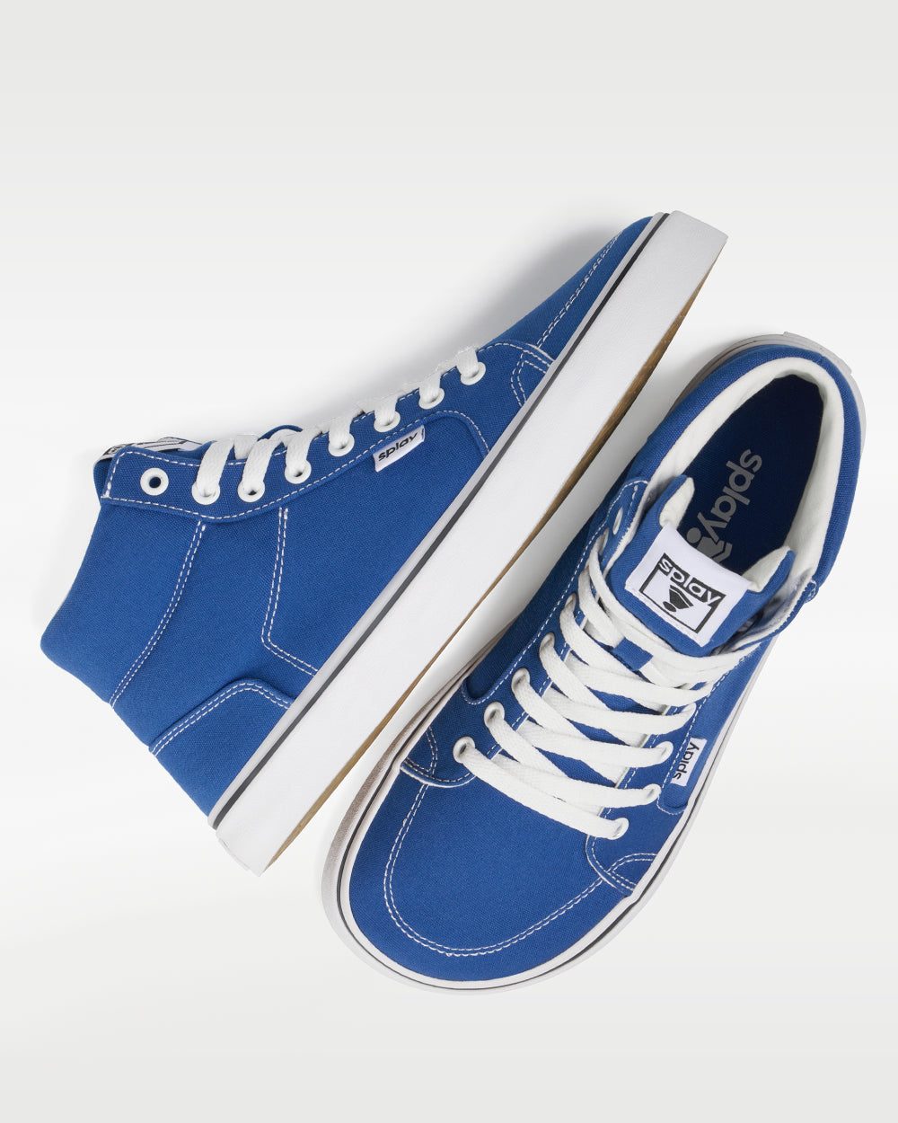 Splay REV HT Canvas San Juan barefoot shoes — high-top skate shoe, pair shot from above, one shoe tipped up to show the insole