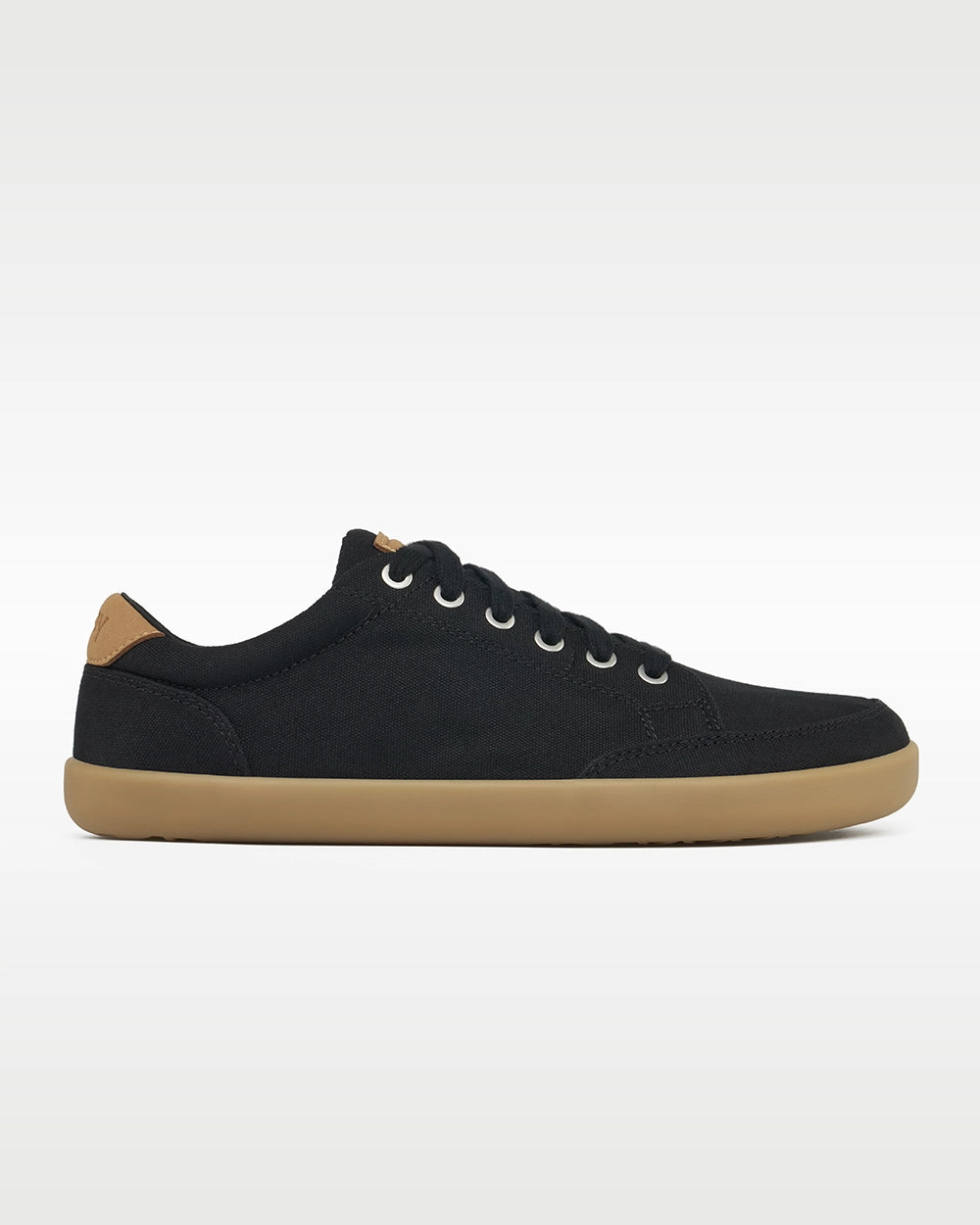 Side profile of the Splay FREESTYLE Shale '26 black canvas barefoot sneaker with a gum outsole and tan heel accent.