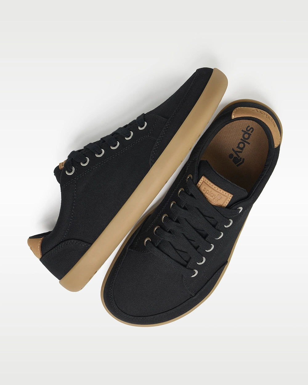 Top and side view of Splay FREESTYLE Shale '26 black canvas barefoot sneakers with gum soles and Splay-branded insoles.