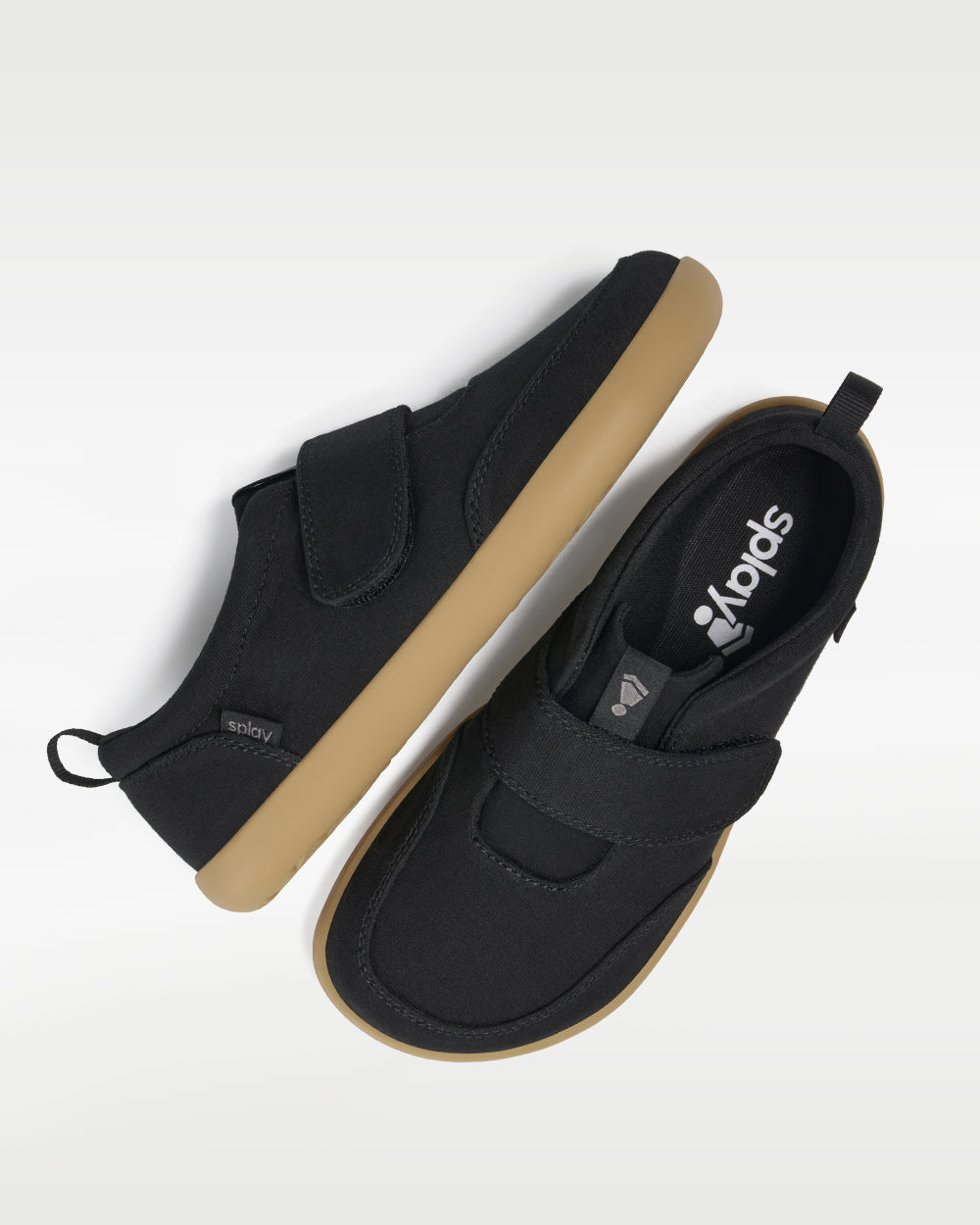 Splay Explore Kids Shale barefoot shoes — kids' low-top shoe with a hook-and-loop strap, pair shot from above, one shoe tipped up to show the insole