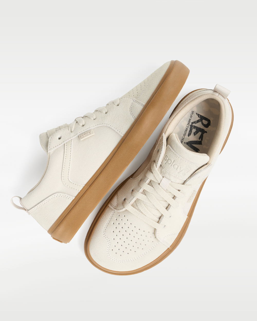 Splay REV LTS Sydney barefoot shoes — low-top suede skate shoe, pair shot from above, one shoe tipped up to show the insole