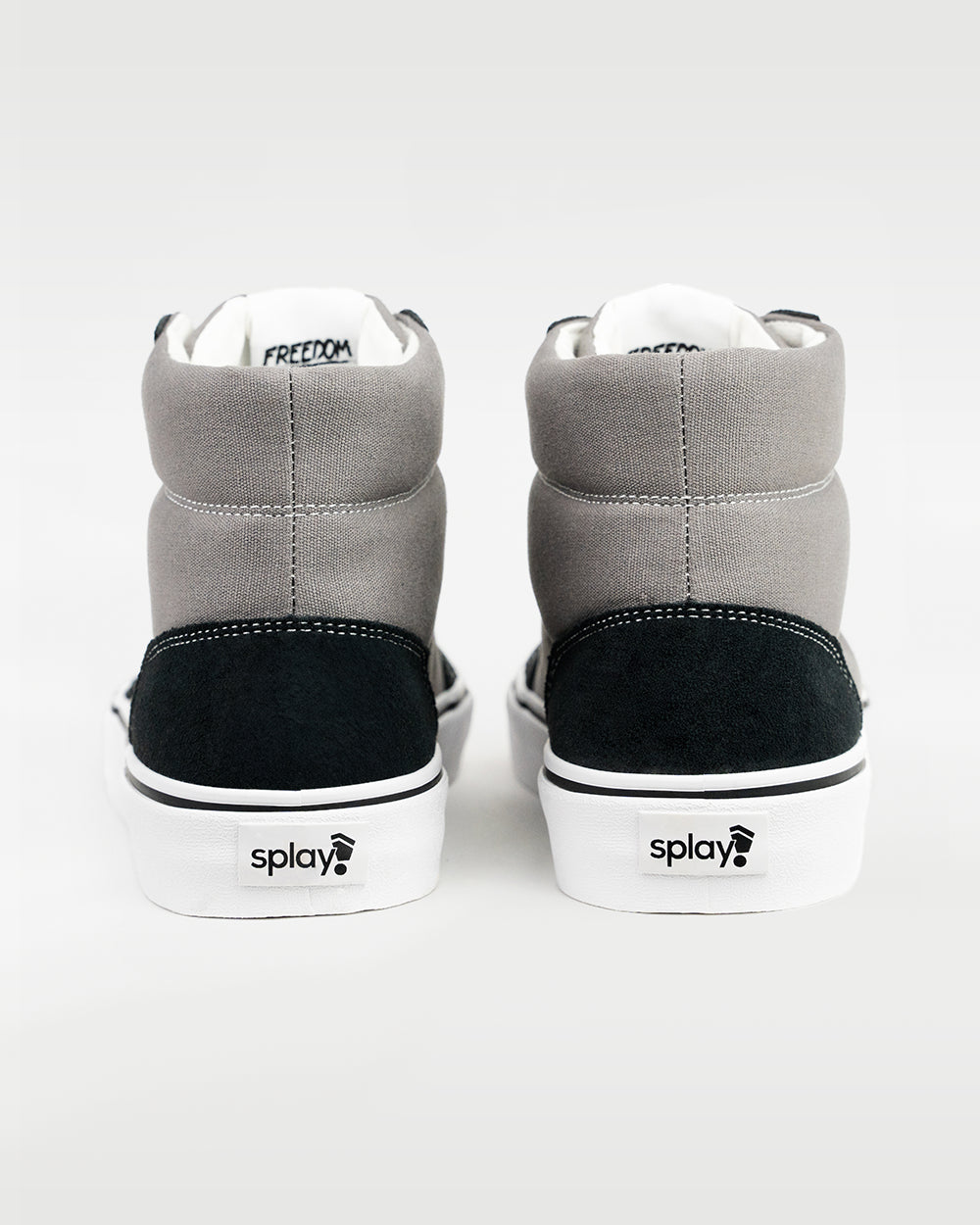 Splay REV HT Original Tokyo barefoot shoes — high-top skate shoe, pair viewed from behind, heels toward the camera