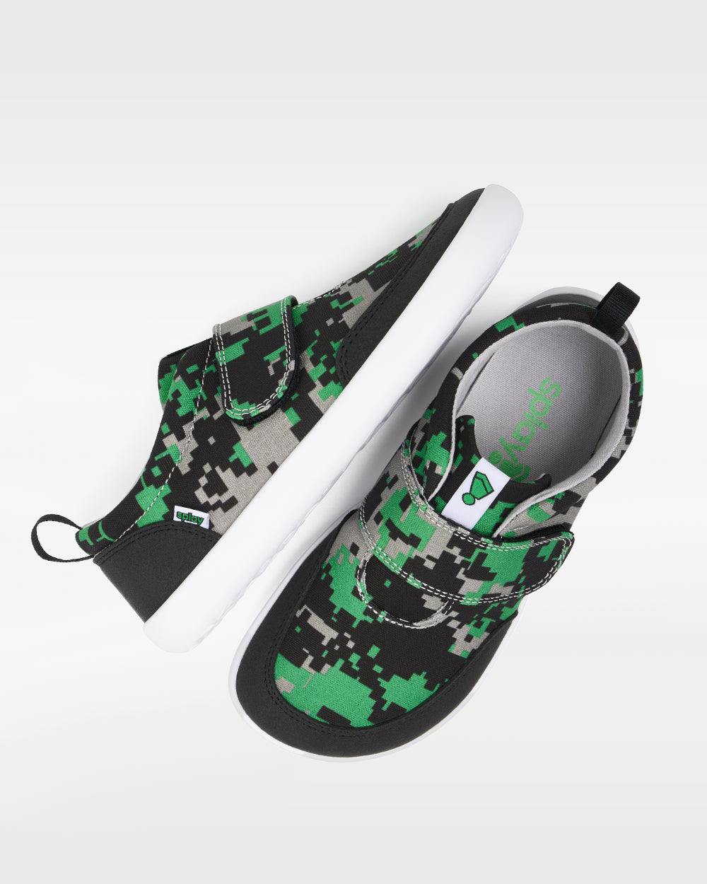 Splay Explore Wild Kids Digicam Green barefoot shoes — kids' low-top shoe with a hook-and-loop strap, pair shot from above, one shoe tipped up to show the insole